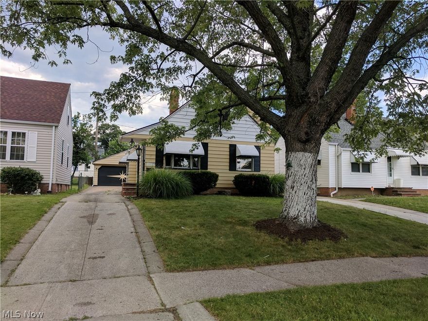 You got to see this. Great location in Garfield Heights Larger than most colorful 4 bedroom 2 bath cape big 2 car garage. Nice covered patio to enjoy the fenced back yard. House is larger than you would expect unique one of a kind that it is pretty open on the first first floor from the kitchen to the large living and dining room, it also has one bedroom and full bath on the first floor. Upstairs has 3 additional bedrooms and an additional full bath. This is a Fannie Mae Home Path property that offers special incentives for owner occupants and qualifies for the ever popular renovation loan that can include all of your very own personal improvements.