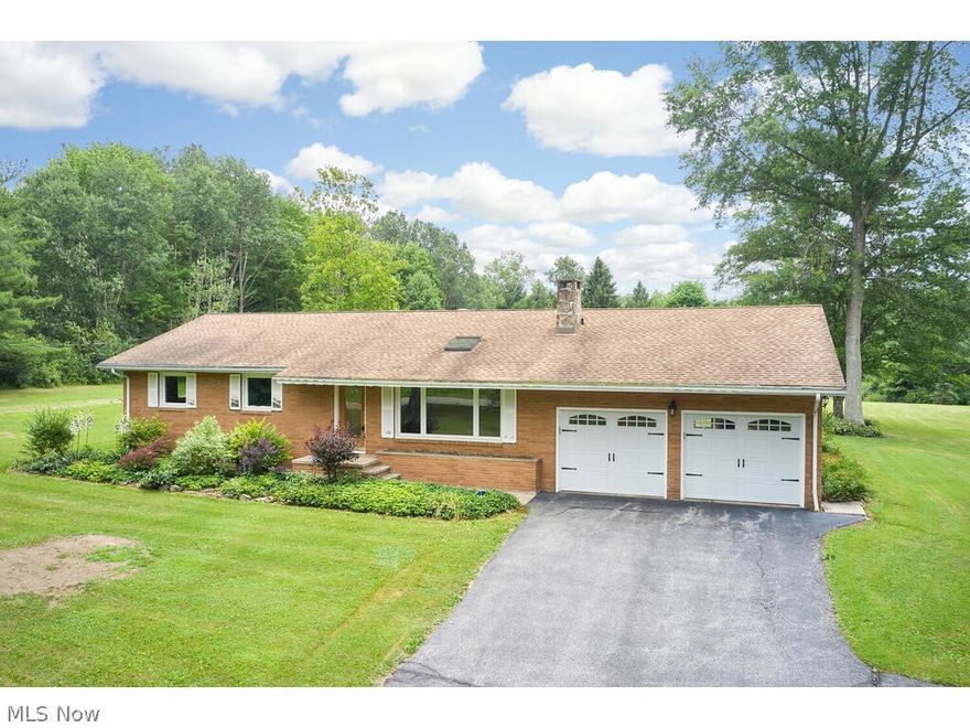 First time on the market! Original owner built home. Located across from Hambden Orchard Wildlife Area on 2.86 acres. Well loved
Chardon schools brick ranch, 3 bedrooms, 2 full baths. 2 car attached garage with additional 2 car detached garage and workshop. Large family room addition with dining area. Updated eat in kitchen. Hardwood flooring in bedrooms, hall and living room. Decent closet space in bedrooms. 2 fireplaces one wood burning and the other propane. Lots of natural light with skylights throughout. Rec room in basement. Roof approx. 10-12 years old, septic approx 10-12 years old, well pump about 1 year old. Washer & Dryer included.  Home warranty!