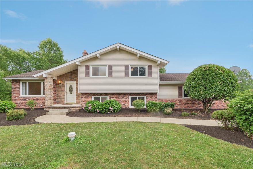 Move right into this three-bedroom, two-bath brick and vinyl split-level home on almost 3 acres. Kitchen with all appliances and a dining area. Floor-to-ceiling brick fireplace in the family room. French doors to the back covered / patio porch. 2-car attached garage. Nicely landscaped. Roof 2020, and newer A/C.