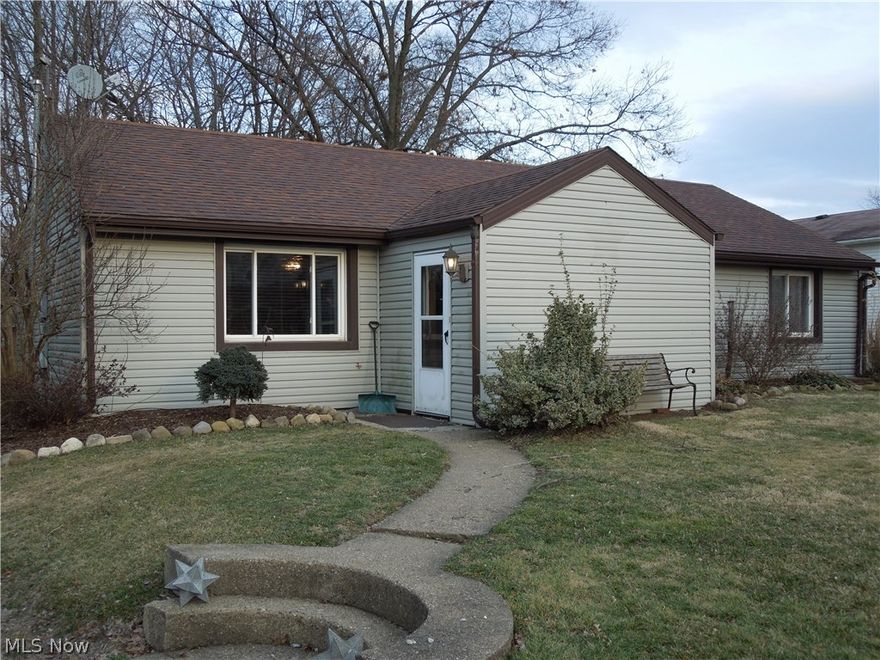 Move right into this 3 bedroom ranch home!  This home features a spacious foyer that could double as an office.  The Living room has plenty of room for the family or guests, the cook will love the updated kitchen with an island and all of the appliances, laundry area is conveniently located just off the kitchen and the washer and dryer remain, spacious master bedroom, beautiful updated bath, relax in the evening on the enclosed back porch that over looks the back yard and can you imagine the fun you will have on the huge deck and pavilion with your friends and family!!  This is truly a must see! Home Warranty included for your piece of mind.