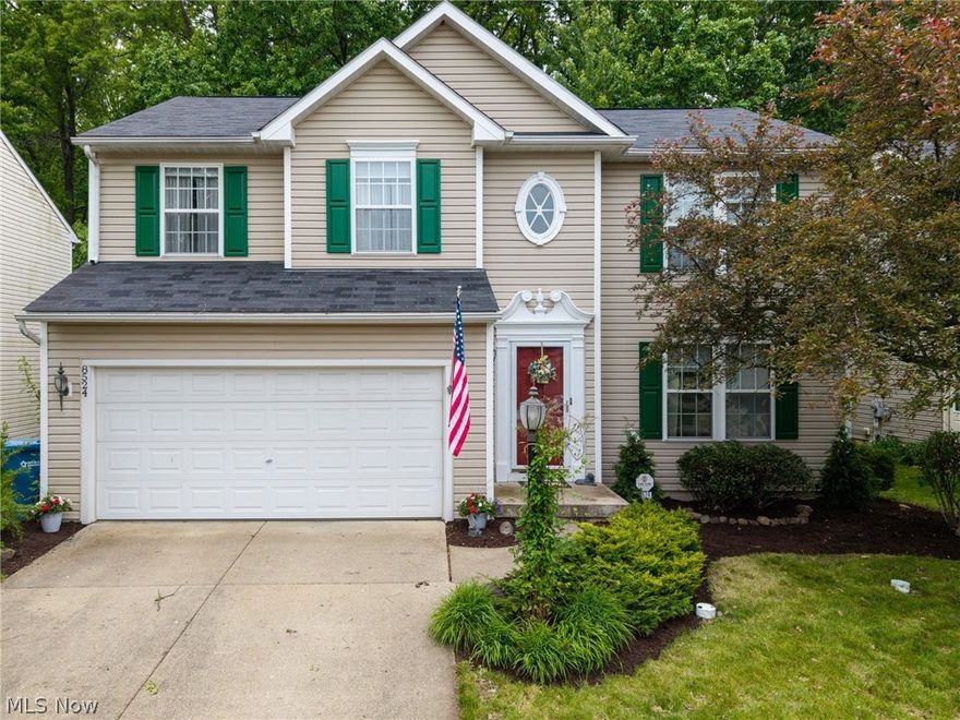 Welcome home to this beautifully updated 4-bedroom, 2.5-bath home nestled in desirable Olmsted Township! Backing up to a peaceful tree lined setting, this property offers the perfect blend of privacy, comfort, and modern style. Step inside to gorgeous hand-scraped hickory hardwood floors flowing throughout the first floor and into the open, spacious kitchen featuring granite countertops, a farmhouse sink, and plenty of room for entertaining. Double pocket doors add charm and functionality, leading to the convenient first-floor laundry and half bath. The laundry room also includes added cabinetry for extra storage and organization. Upstairs, the spacious master suite features a private en suite bath and a custom walk-in closet designed for maximum storage. Additional updates throughout the home include newer sinks and toilets for a fresh, modern feel. The finished lower level provides additional living and entertaining space, while the tankless hot water heater adds efficiency and convenience. Outside, enjoy relaxing or hosting gatherings on the paver patio overlooking the fully fenced backyard with a wood privacy fence and beautiful wooded backdrop. Completing the home is a 2-car attached garage. This move in ready home combines thoughtful updates, functional living space, and a serene setting all in a fantastic Olmsted Township location!