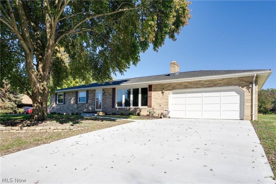 Fully renovated & move-in ready ranch within Lake Local Schools, take a look! Darling all brick exterior with a brand new (2021) concrete driveway, all newer vinyl windows, and a beautiful back yard for entertaining with a fire pit, beautiful refinished deck, privacy landscaping, and a newer shed. Inside, all interior trim has been freshly repainted, real hardwood has been refinished, and all carpeting is brand new. Kitchen is loaded with stainless steel appliances and beautiful natural wood cabinets. All three bedrooms are generously sized including the master suite with fully refinished master bath. The second full bathroom, also remodeled, features a beautiful subway tiled shower. The basement is prepped and ready to be finished if buyer wishes to do so - one framed room does have paneled walls and is ready for new flooring to be a finished rec room. There is direct access from the basement to the garage for an easy work space or rec room. Garage floor has new epoxy sealant (2021).