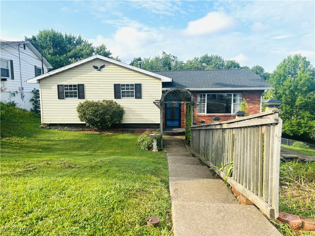 Welcome to this move-in ready home nestled on a quiet street in the peaceful and convenient Harmar Hill neighborhood. This surprisingly spacious bi-level home features vaulted ceilings in the open-concept living room and eat-in kitchen, creating a bright and airy atmosphere. The generous kitchen offers classic oak cabinetry, brand-new appliances, and opens to a covered deck—perfect for outdoor dining while overlooking the expansive backyard. Upstairs, you’ll find a full hall bath and three roomy bedrooms, including a primary suite complete with its own private half bath. The lower level boasts a finished family room that offers plenty of additional living space and walks out to a concrete patio—ideal for entertaining, grilling, or simply relaxing. Recent updates include a new roof, new HVAC system, and new kitchen appliances, offering peace of mind and modern comfort. Don't miss this opportunity to own a well-maintained home in a great location!
