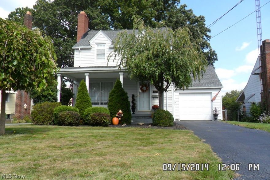 This Home makes a statement inside and out.  Lovely home that features:  Hardwood floors throughout, spacious living room with gas fireplace, large master bedroom with double closets, formal dining room, large back patio for entertaining, fenced in back yard, French door that leads to sunroom that could also be used as a den or office and tasteful landscaping. Most recent updates include: new kitchen counter and sink, freshly painted rooms with neutral colors, vinyl siding, roof, furnace and windows.  Basement is waterproofed and has a sump pump.  Everything has been done for you.