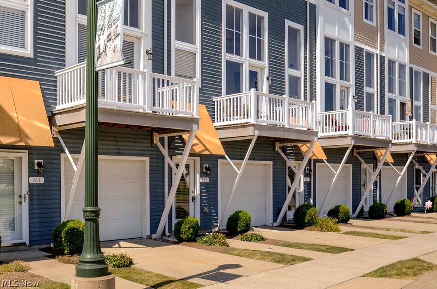 Waterfront Townhouse in the exceptional HarborWalk waterfront community on the shores of the Black River near Lake Erie. Stunning waterfront views and stunning sunsets from the walls of windows in this beautiful Multi-Level Contemporary 2 bedroom 2 ½ bath home with 2 one car garages with separate entrances. Spacious living on each level with an open floor plan and tall ceilings. Awesome Great Room with 14ft ceilings, fireplace and open to kitchen above! Awesome master suite with master bath and walk-in-shower! Amenities include fitness center, outdoor swimming pool, club house! Dock available in marina! Watch the boat traffic and listen to music from the Black River Landing! Awesome waterfront living!