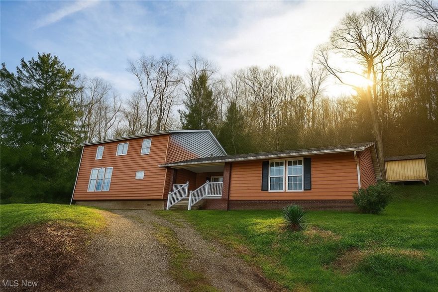 Discover your dream home in this breathtaking contemporary residence situated on a sprawling 1.96-acre lot. This remarkable property features 4 spacious bedrooms and 2.5 baths, offering ample space for both relaxation and entertainment. As you approach the home, you are greeted by a welcoming porch, perfect for enjoying the fresh air and sunshine. Inside, the open and flowing floor plan encompasses approximately 2,907 square feet of elegant living space. Luxury vinyl plank flooring and tall French windows create a bright and inviting atmosphere, flooding the interiors with natural light. The cozy living area, complete with a fireplace, is ideal for unwinding or hosting gatherings. The beautifully designed kitchen boasts granite countertops, built-in cabinetry, and a breakfast bar that seamlessly overlooks the dining area, which features expansive windows that bathe the room in light. Step through the back door to discover your outdoor patio, where you can soak in the sunshine and breathe in the fresh air while appreciating the serene views of your spacious yard, surrounded by trees that provide both shade and privacy. The 3-car garage offers plenty of room for vehicles and additional storage, making it the perfect complement to this exquisite home. Don’t miss your chance to make this beautiful residence your own! Schedule a viewing today before it’s gone! Being Sold AS IS, WHERE IS. Buyer is responsible for all inspections & city requirements for closing. All info, including utilities & room dimensions, is approximate, deemed reliable but not guaranteed, & should be independently verified. The seller does not guarantee that all property details are included.