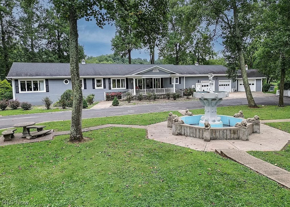 This stunning riverfront property offers a 4 bedroom, 3.5 bathroom home on 3.4 acres of land. Originally constructed in 1990 by union labor, the house underwent a complete renovation in 2014, ensuring modern amenities and quality. The property features a Generac generator, a 3 stall garage, 2 stall boat garage, and a utility yard shed. The kitchen is equipped with high-end appliances and a gas fireplace, perfect for cozy evenings. With a resurfaced driveway in 2020, a private boat launch off Murray Dr., and a full outdoor kitchen with power, water, and water heater, this home offers both luxury and practicality. Notably, the home remained unaffected by flood waters in 2004 and 2024.