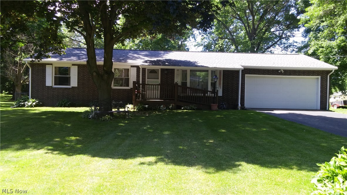 Cozy brick 3 bedroom ranch with beautiful yard in clean well maintained brick ranch. Available possession in July. With 1 1/2 baths, 2 car garage and fenced in back yard with deck, shed and fire pit. This home is waiting for your family. Very nice, quite neighborhood. Laundry hook ups on first floor and basement. The area is looking to put in sewer and a vote to seek a bond for the assessment is in progress for 2017.
