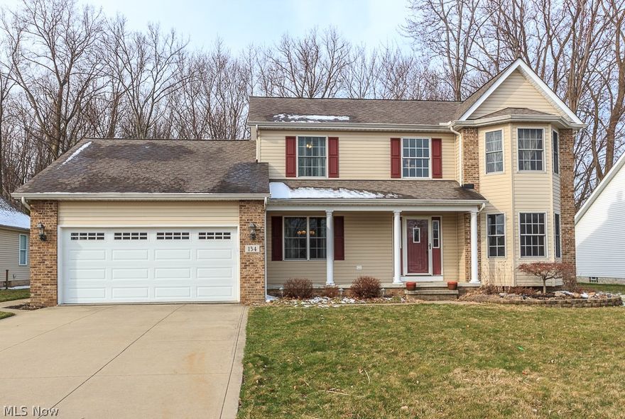 Move right in to this well maintained 4 bedroom, 2.5 bath colonial with over 2400 sqft of living space and an open floor plan! Great room features a cozy gas fireplace, recessed lighting and a bay window offering plenty of natural light. Large eat-in kitchen with ceramic tile flooring, center island with bar top seating and a bay doorway out to the stamped concrete patio perfect for entertaining. Formal dining room with wood laminate flooring. 
First floor laundry with additional pantry space. There is also an office which can be used as a 5th bedroom. Upstairs there are 4 spacious bedrooms including the master suite with another bayed window, walk in closet, attic access and a master bath that features a spa tub and shower.  The unfinished basement offers an abundance of storage or potential living space.
Gorgeous park-like, wooded backyard is great place to enjoy family gatherings. There is even a 12x16 shed for extra storage. 2 car attached garage with water and gas hookup. Excell