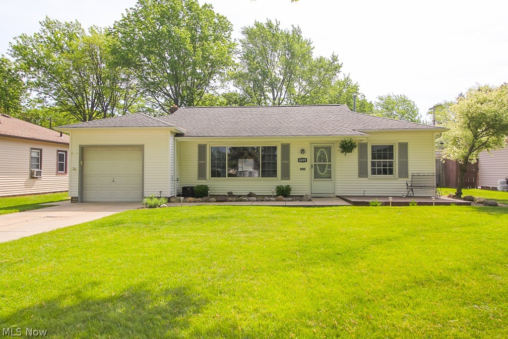 Welcome home to this well-maintained ranch in the heart of Parma Heights! This 2 bedroom 1 bathroom home is move-in ready with tons of room to entertain. When you walk in you are greeted with a large family room (new vinyl flooring 2019) that opens to the kitchen complete with an eat-in area connecting you to an additional living space (new carpet 2019) that can be used for a sitting area, playroom, dog room, etc. The large fenced-in backyard is the perfect place to host, garden, or quietly enjoy all to yourself. One-year home warranty included for buyer’s peace of mind! Other updates include bathroom vanity 2018, toilet 2017, carpeting in master bedroom 2018, AC = 2017, HWT = 2019 & mostly new fixtures throughout. Located in close proximity to The Shoppes of Parma, highways, restaurants, gas stations, & grocery stores. Don’t miss out on this gem!