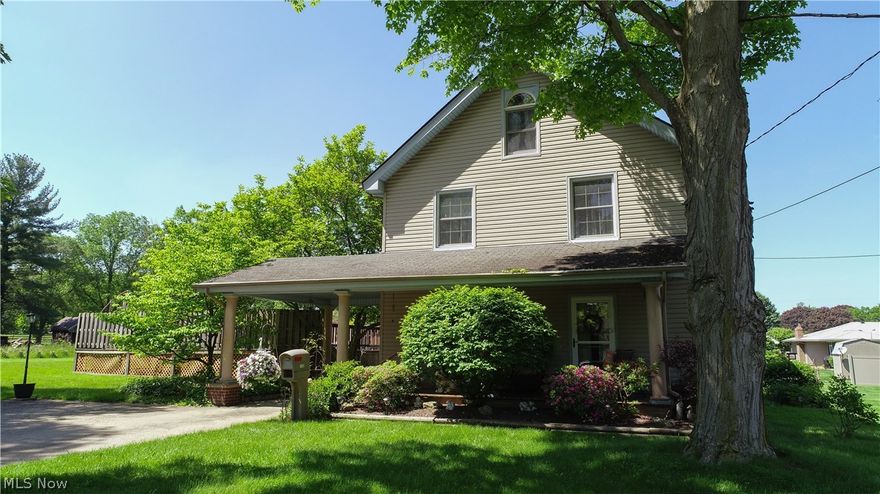 Charming Poland Township classic 2 1/2 story Colonial on 3 lots (150 x 140 total lots & .4830 total ac). Enjoy the vast wonderful park-like setting on your 21 ft covered front porch and the 31' round above ground pool with deck. The spacious 11 x 22 Living Room is cheerful and practical. The hardwood floors, beaitiful stone fireplace with oak mantel, & built-in oak and glass bookcases add plenty of useful charm. The Dining Room has oak hardwood floors and plenty of light for your dining enjoyment.  A renovated Kitchen features Kraftmaid wood cabinets and ceramic floors.  A breakfast room with cabinets completes the first floor charm.  Dual oak doors from living room & kitchen lead to the 2nd floor.  The 2nd floor has 3 large bedrooms with oak hardwood floors, plenty of natural light and a large rennovated full bath. The 3rd floor features a finished  "bonus room" approximately 624 sq ft that is not included in total sq ft description.  Let your imagination go wild as to its potential use as extra sleeping area, recreation room, craft room, home office or the like. Home features include new furnace and AC, newer windows, vinyl siding, and the attached portico adds extra covered carport space & character to this delightful home . There is a 400 sq ft detached garage and plenty of driveway parking.  Seller is including a one year home owner warranty. Make this delightful house your new home!