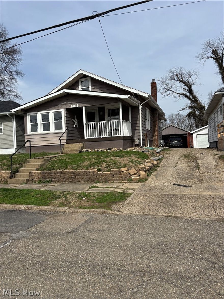 Immediate Possession for this very nice 2 Bedroom Home. Home has a full basement and also a walkup attic with plenty of room for storage.  There is a shared driveway that leads to the 14' x 20' carport.  Front porch and a back deck that has a newer fenced in yard.  Home being sold "AS-IS".