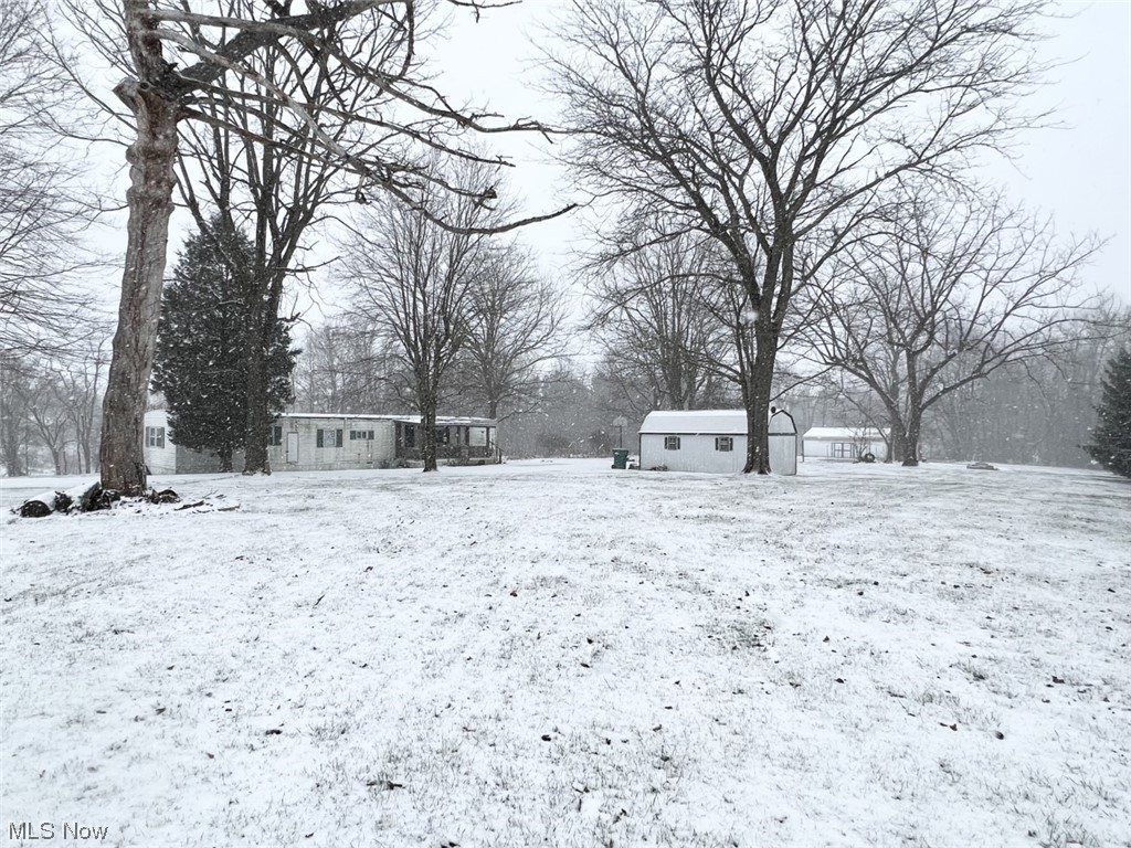 HORSES BUT ON A BUDGET? Take a look at this 3 bedroom trailer complete with a 3 stall horse barn on 2.6 acres of ground! Gas heat, central air and listed at 59,900!