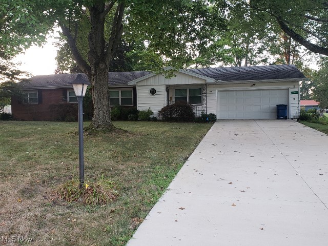 3 bedroom ranch with first floor laundry bath and a half. has new driveway newer windows, garage door,central air and furnace. many other updates . Has full basement 2 car garage. Hard wood floor in den. Florida room roof is 8.5 years old.