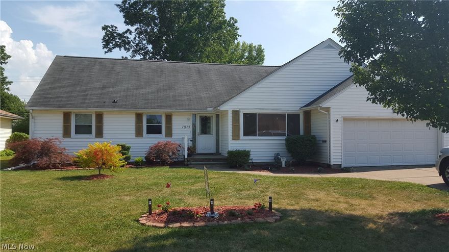 Awesome price!  Awesome location!  Newer kitchen opens to huge dining room with fireplace!  Newer windows throughout! Upstairs could be master suite or in-law
suite.  Full basement, 2 car garage, newer roof and vinyl siding complete this outstanding cape cod across from the elementary school!