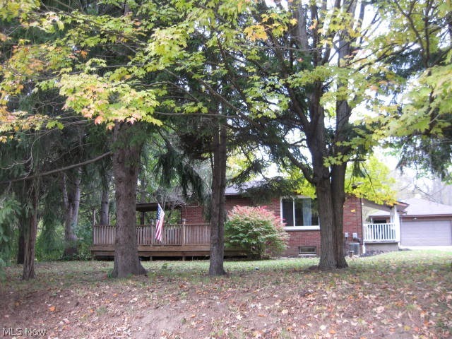 Looking for Country Living then Welcome Home! Brick Ranch, Yet close to restaurants, shopping & expressway. There is woods & a pond on property. Home is completely redone. All appliances, newer kitchen, 1 bathroom, oak hardwood flooring in living room & hall way. Two bedrooms-Master, brand new carpet, second bedroom-built in storage unit. Crown molding thru out home. Lots of room for extra storage in waterproofed full basement which includes a French drain. Possible hook up for second bathroom. 28x19 Deck partially covered on front of home. 12x6 Side Porch entry to kitchen. Up Dates: Well Pump 2018,
New Hot Water Tank 2017, New Septic 2013 & Updated Electric. Whole house water filtering system. Bryant Furnace & Air Conditioner has recently been serviced. Two car garage 23x23. Electric 220, Electric Base board heat on West wall side of garage plus door opener. 22x8 Lean to attached to back of garage. Out building 32x26 Includes room that could be used for Crafts, Hobbies or Work Shop w
