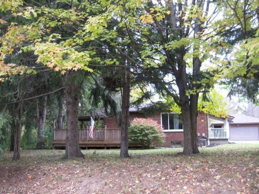Looking for Country Living then Welcome Home! Brick Ranch, Yet close to restaurants, shopping & expressway. There is woods & a pond on property. Home is completely redone. All appliances, newer kitchen, 1 bathroom, oak hardwood flooring in living room & hall way. Two bedrooms-Master, brand new carpet, second bedroom-built in storage unit. Crown molding thru out home. Lots of room for extra storage in waterproofed full basement which includes a French drain. Possible hook up for second bathroom. 28x19 Deck partially covered on front of home. 12x6 Side Porch entry to kitchen. Up Dates: Well Pump 2018,
New Hot Water Tank 2017, New Septic 2013 & Updated Electric. Whole house water filtering system. Bryant Furnace & Air Conditioner has recently been serviced. Two car garage 23x23. Electric 220, Electric Base board heat on West wall side of garage plus door opener. 22x8 Lean to attached to back of garage. Out building 32x26 Includes room that could be used for Crafts, Hobbies or Work Shop w