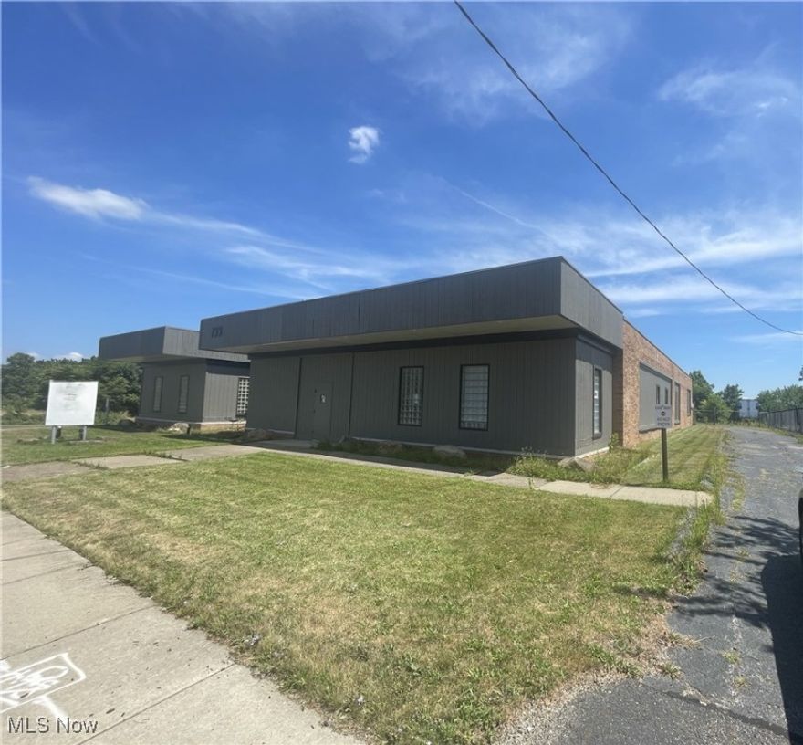 Exceptional location just North of YSU. Zoned Mixed Use Community MUC ideal for business or University housing, redevelopment: 125' frontage on Wick Ave., 310' deep. 0.89 Acre Site.  7363 SF single story building with approx. 5000 SF of warehouse.  Large lower parking lot, large gated yard area with shed. Office side consists of large lobby with double door exterior lobby, conference room or large office, private office, 2 large L shaped work areas, storage room, small mechanical closet. Owners private restroom plus large public restroom with 2 commodes/stalls. Renovated, clean, ample parking close to private entrance. Peaked ceilings in lobby with new skylights. Newer high efficiency HVAC and Water Tank, filtered drinking water system, monitored cellular security. Existing phone system. Warehouse side features drop ceiling and large 10' ceiling area. Large public restrooms, small maintenance room, janitor room with sink. Seller wants to keep southwest suite of offices that are approx. 500 SF. 1 block north of Wick exit off Madison Ave. Across from Ursuline High School, close to Hospital, YSU/downtown and freeway. Owner will consider lease back of office space. Broker owned. By appointment only.