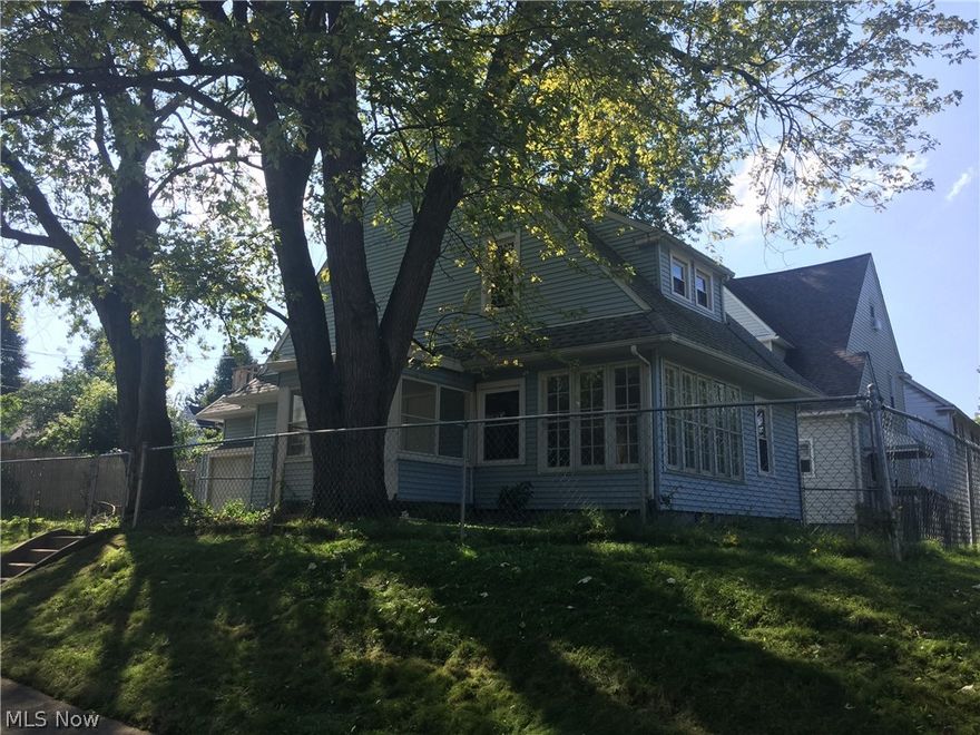 Looking for a lot of house?! Set a private viewing for 396 North Firestone Blvd. today! sitting on one of Firestone parks historic  Boulevards  this three-bedroom possible four bedroom has tons to offer its new owner including- new carpet in the giant living room with gorgeous windows letting in tons of natural light, new flooring totally repainted formal dining room with a beautiful chandelier and french doors, totally redone kitchen including flooring -cabinets - backsplash- sink and paint, freshly painted throughout, vinyl siding, brand new bathroom!, totally remodeled, downstairs possible 4th bedroom/library/or home-office with tons of character, full basement, newer entry doors, enclosed front porch,  enclosed front porch, fenced in yard, attached garage, sitting on a very nice corner lot and offering a  Home Buyers Warranty! Call today!