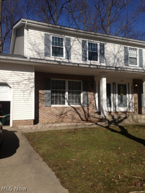 Stunningly remodeled town home style unit available for rent in Stow! Fantastic bright, sunny and clean unit redone from top to bottom. Plenty of counter space in this modern eat in kitchen. Dining area opens to the spacious and bright living room. Bedrooms are very large, master has double closets! Full basement with washer and dryer hookups. Back patio off the kitchen overlooks the wooded lot. 2 car garage. Dont miss it! All adult occupants must apply online for credit criminal and eviction history. Income verification required. $35 application fee. No smoking, no section 8.