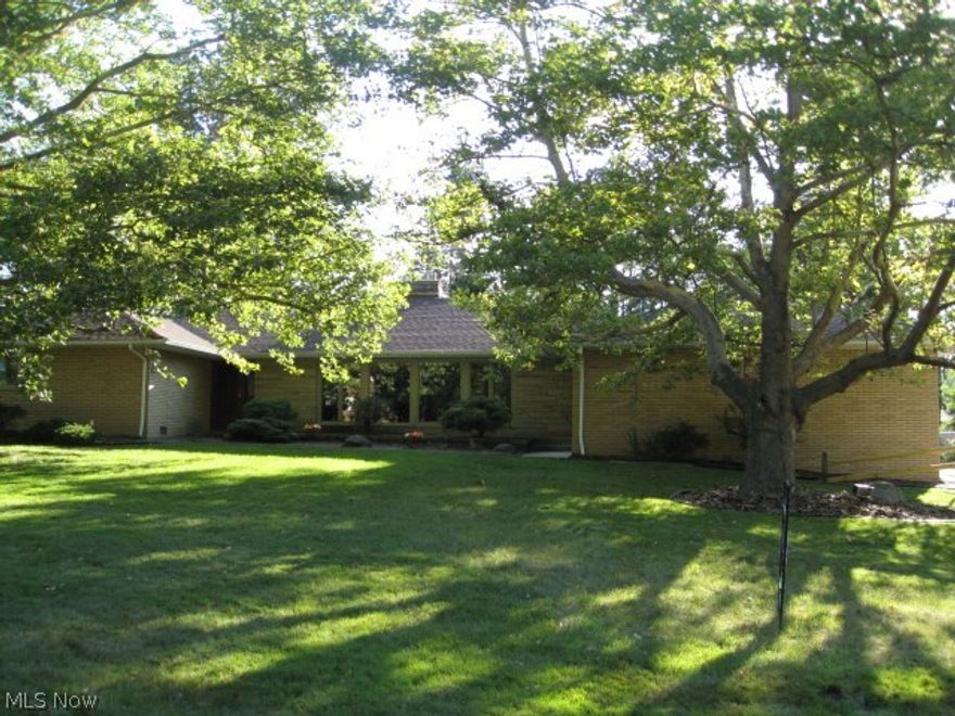 One of a kind Brick, custom-built mid-century modern ranch. Set on a very desirable cul-de-sac in Bedford. Close to Metro parks.With over 2300sq ft. There is plenty of room to grow, or entertain. Two full baths, and one half. Three large bedrooms feature hardwood floors, and large double closets. 30x15 living room with wood fireplace. Eat in kitchen has plenty of storage, and newly refinished back splash. Full dining area. First floor laundry room. Large heated two car attached garage has hot and cold water, with new insulated door and opener. Partially finished basement with additional sq..ft. Has a custom wet bar, fireplace. Additional full kitchen, and half bath. Recent improvements include, dimensional roof 2012, garage door 2015 ,triple pane patio door and entry doors 2003, front Pella windows 2008, boiler 2007. 10x14 shed, with new roof.

One year HMS home warranty...Violation FREE Home!