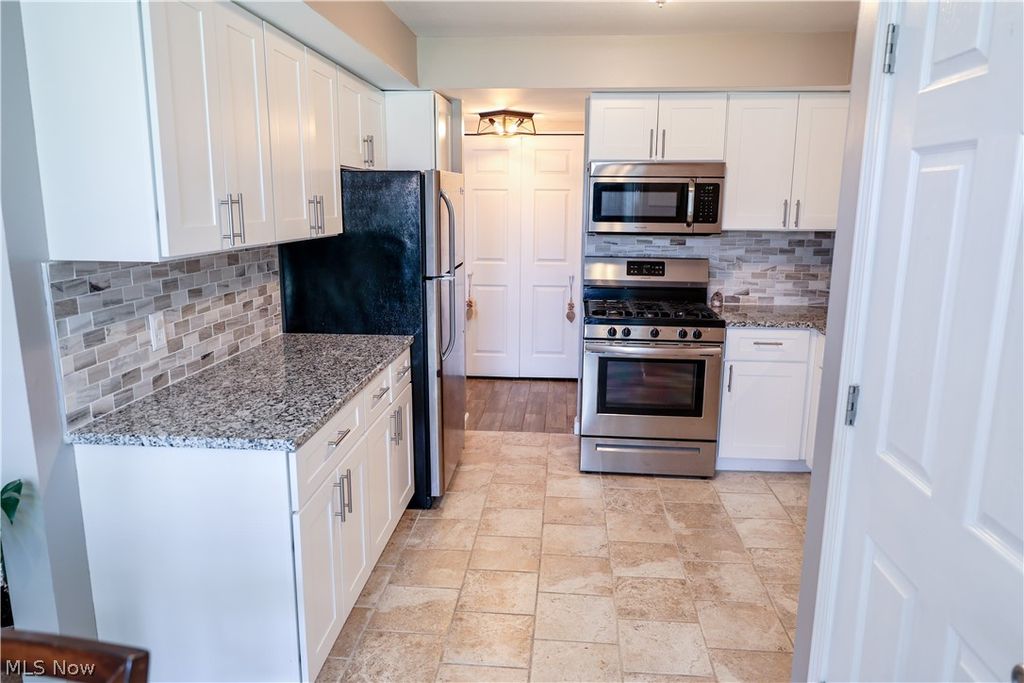 Photo of 1145 Canyon View Road #102, Sagamore Hills, OH 44067 (MLS # 5205774)