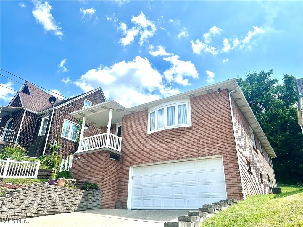 Welcome Home! This lovely 3BR, 2BA brick ranch located in Weirton, WV is waiting for you. So spacious with a large living room open to the dining area and nice eat in kitchen. Convenient first floor laundry located in one of the bedrooms could be moved to hookups in the full basement with loads of storage, full bath, finished rec room and 2 car garage. Gas heat, central air conditioning, updated vinyl windows and a nice back yard with alley access. This home has been well cared for while boasting quality with pride in ownership. Don't wait to call to schedule a showing before it's too late! Home Warranty Included.