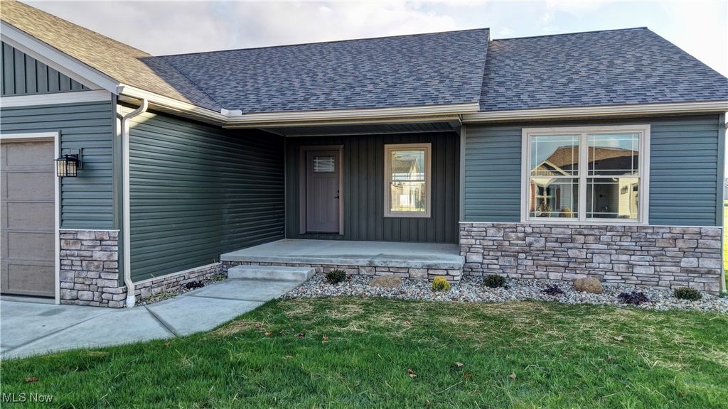 Photo of 913 Zerelda Street NW, Strasburg, OH 44680 (MLS # 5175538)