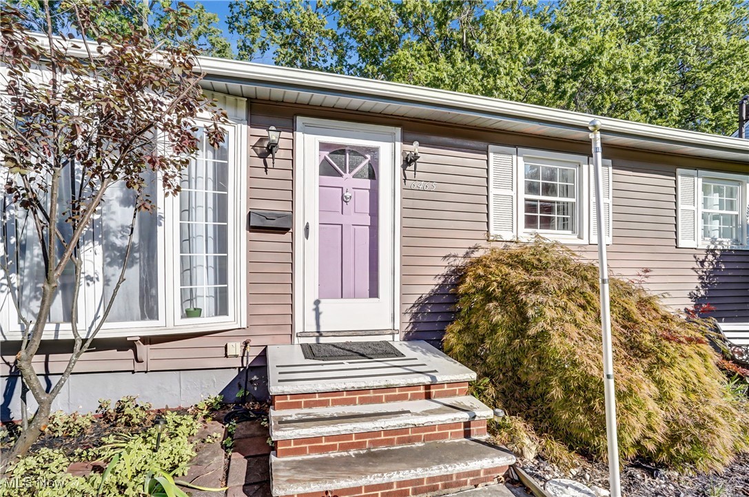 Welcome home to this beautifully maintained ranch offering the perfect blend of convenience and charm. With two bedrooms, a first floor laundry and gleaming hardwood floors. This home is designed for easy living. Step into the inviting family room with a cozy fireplace - perfect for gatherings on cool evenings. Enjoy outdoor living in the fenced backyard, complete with a patio that's ideal for entertaining, grilling or relaxing in your own private retreat. Other room is presently a first floor laundry with full bath. Laundry hookup also in the basement. Attached to the garage is a room with full electric and heat offering endless possibilities - perfect for a workshop, home office, gym, craft room or extra storage.