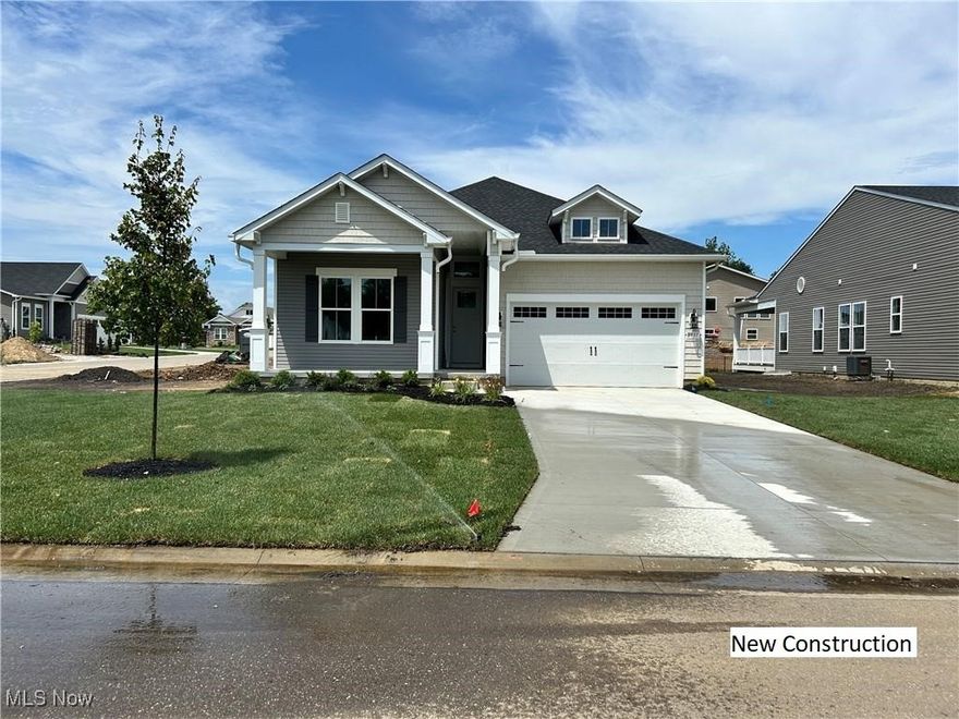 Ready for move-in as early as the end of July, this stunning execution of our popular Boise floorplan sits on a premium corner lot offering timeless design with luxurious comfort. You’ll love low-maintenance Heritage Park, where landscaping and snow removal are included for a low monthly fee. This refined ranch-style home offers 3 bedrooms, 2 full baths, and a private office with barn doors on the main level. Enjoy outdoor living with both a covered front porch and rear deck. Inside, soaring 10ft ceilings, 8ft doors, and 6ft tall double-paned windows create a grand, sun-drenched interior. Custom millwork and tray ceilings in the foyer and primary suite add timeless character, while a gas fireplace warms the living room. This designer kitchen boasts white cabinetry, Soapstone Mist quartz countertops, a full-height arabesque tile backsplash, and an upgraded GE Café appliance package with 36" range, in addition to the wall oven, and built-in microwave. The spa-like primary bath features a freestanding soaking tub and a frameless glass shower with tile to the ceiling. A main-level laundry room with a large window and utility sink adds everyday convenience. The finished basement includes an additional bedroom, full bath, and a spacious 24' x 26' rec room. Every detail is thoughtfully curated—our homes feel custom without the wait.
