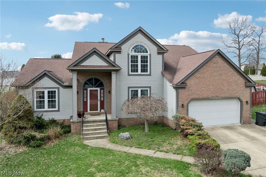 Welcome to this custom-built Colonial in Uniontown, offering the perfect blend of space, comfort, and functionality in the desirable Greentree neighborhood with minimal through traffic. A striking two-story foyer opens to a versatile formal dining room, currently used as a cozy sitting area. The dramatic two-story living room features soaring ceilings, abundant natural light, and a stunning stone fireplace—ideal for relaxing or entertaining.

The eat-in kitchen offers ample cabinetry, a walk-in pantry, planning station, and a dining area with direct backyard access. A convenient first-floor laundry room and half bath are located nearby. The first-floor primary suite is a private retreat with vaulted ceilings and a spa-like ensuite featuring double sinks, soaking tub, separate shower, skylight, and walk-in closet.

Upstairs includes three generously sized bedrooms, a full bath, and a flexible loft space. The unfinished basement provides endless potential for storage or future living space. Outside, enjoy the fully fenced .28-acre yard with a stamped concrete patio and pergola—perfect for entertaining.

Additional highlights include an attached two-car garage, newer bedroom windows, and a newer hot water tank. Located near shopping, dining, and entertainment in the North Canton School District with no city tax.

Showings begin 4/23/26 from 4:30–7:00 PM. Starting Price listed. Offer deadline 4/29/26 at 8:00 PM. Seller may accept an offer at any time. Pre-completed home, well, and appraisal inspections available upon request.