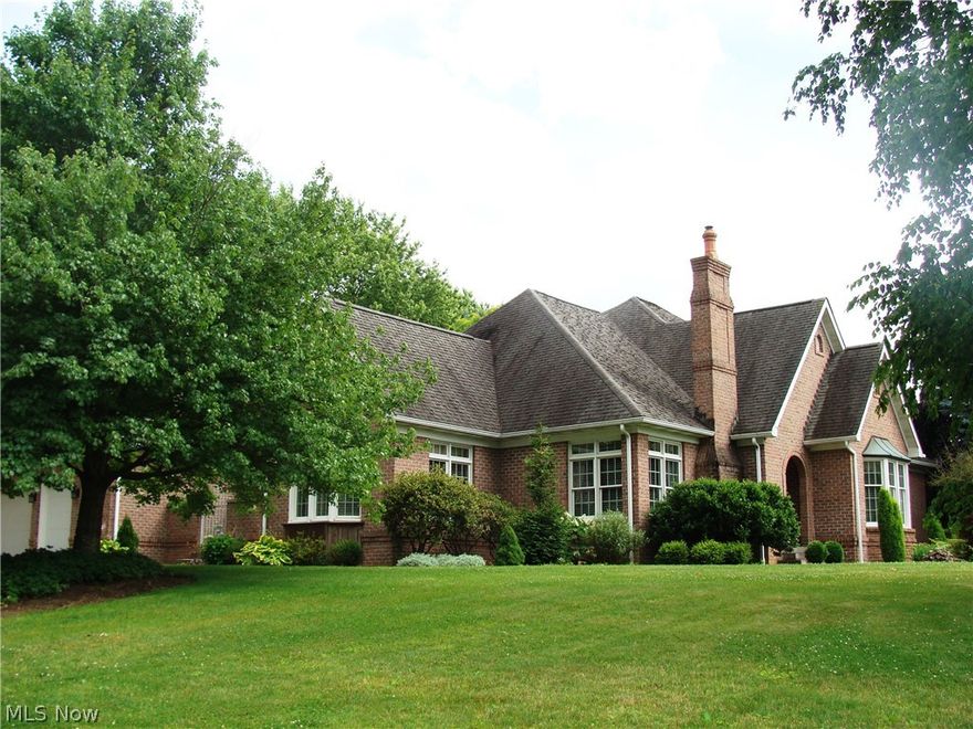 Brick Architectural designing in this quality one owner home. Quality crown molding, high baseboards & upgraded trim, 6 panel hardwood doors, Mahogany front door & huge dining room w/fireplace. There are 3 fireplaces in home. Awesome kitchen w/ivory cabinets, corian counter tops, stainless high end appliances and wood paneled subzero frig. Great room has 12’ ceiling, custom moldings & French doors. Oak hardwood flooring in many rooms, Transom lite windows & wood Venetian blinds. Breakfast or Sun room w/bay window leads to one of 3 terraces. Master br w/fireplace & tray ceiling & built-ins. Master bath (12 x 12) has ceramic tile a garden tub & private commode room.13 block huge basement is studded & ready to finish. Central vac. Gordon Bros. water conditioning system. 2 separate stairways to the basement. 3 car garage, concrete drive, professional landscaping. Garden Shed has electric & water. Next door to Salem Golf Club. Must see to appreciate.