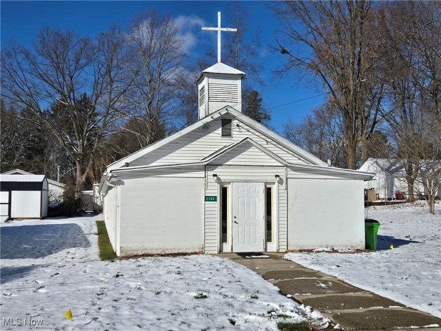 What a great opportunity for any Non Profit Owned Organization looking for a place to operate out of. Historic Baptist church since 1963 with a large foyer and a stage welcoming you as you enter. The stage has a full sound system set up too. It offers two half baths near the front door, two additional rooms in the back, and office style room behind the main foyer. Across the street is a full lot (.37) that was used as a parking lot/outdoor activity area since it also has a shed and pavilion. Wonderful opportunity for so many kinds of uses!