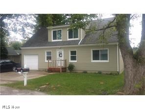Beautifully renovated cape cod in Vermilion on the Lake. 1962 sq ft with a very large master bedroom. All new in the last 3 years - windows, interior doors, storm doors, electrical, furnace, all light fixtures, carpeting, vanity and flooring in upstairs bath, dry wall, kitchen cabinets, flooring and plumbing, plantation blinds, security lighting, privacy fence on the north side of the yard. Sewer lateral lines cleaned out. Siding freshly painted. There is a large 21x31 deck in the back yard that is all fenced in. Only a couple of hundred yards from the lake. Must see this home, not a drive by - much bigger than it looks.