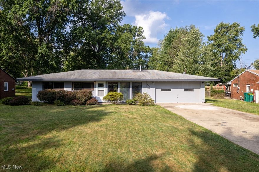 Welcome to this charming 3-bedroom ranch on over 1/2 acre, just a short stroll from the shores of Lake Erie! This stunning 3-bedroom, 1.5-bath ranch boasts an open floor plan that feels remarkably spacious, thanks to its impressive vaulted ceilings. Step inside and be wowed by the airy, modern interior that’s much larger than it appears from the curb. The heart of the home is the fully applianced eat-in kitchen, featuring sleek stainless steel appliances and a large island that flows seamlessly into the expansive great room—perfect for entertaining or cozy nights in. Gleaming laminate flooring runs throughout, adding warmth and style. From the great room, step out onto the brand-new 20x8 paver patio(2025), ideal for outdoor relaxation or gatherings. The spacious laundry/mudroom, conveniently accessible from the kitchen and garage, leads to a generous 20x20 patio, perfect for summer barbecues. The fully fenced backyard offers privacy and includes a 24x8 shed for extra storage and a new fire pit(2025) for evening enjoyment. Three nicely sized bedrooms share a beautifully updated full bath, with a convenient half bath for guests. Located within walking distance to a private beach club and Osborne Park, this home is also close to shopping, dining, Mentor schools and Lake Catholic High School. (New interior doors & new furnace 2024, washer & dryer do not convey) Don't miss this rare opportunity to own a move-in-ready gem in a prime location near Lake Erie! Schedule your showing today!