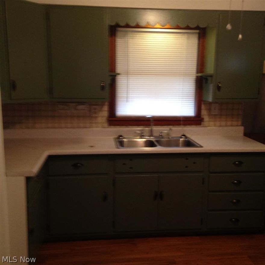 Very nice one story home with newer roof and siding. Fenced yard with a 1 car garage.