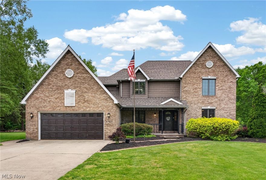 Experience resort style living every day in this stunning Cul-de-sac home situated on a private .75 Arce lot in Desirable Avon, Ohio and offers the ultimate staycation backyard designed for entertaining and everyday enjoyment. Step outside to your own private retreat featuring a large, covered patio, an in-ground pool with a brand-new built-in retractable cover for added convenience and security, and a professionally installed 5-hole putting green with chipping mat to perfect your short game. Beyond the pool area, relax around the additional patio and fire pit or take advantage of the spacious storage shed with loft. The professionally landscaped yard is enhanced by newer exterior lighting and a 9-zone irrigation system to keep everything looking its best year-round. Inside, the chef’s kitchen is fully equipped with a commercial-grade cooktop, vented range hood, double ovens, granite countertops, tile backsplash, oversized island, and abundant cabinet storage — perfect for hosting gatherings large or small. The spacious family room features a beautiful wood-burning brick fireplace, crown molding, and custom built-ins. The oversized first-floor office provides a quiet and comfortable workspace. Brazilian teak flooring flows throughout most of the first floor, complementing the home’s rich natural wood trim. Brand-new carpet has been installed throughout the upstairs and office area. The owner’s suite offers a large walk-in closet with custom shelving and a luxurious en-suite bathroom featuring dual granite vanities, stunning tile flooring, abundant cabinet and countertop space, and an impressive tiled walk-in shower with bench seating, dual shower heads, and seamless glass doors. The finished basement expands the living space even further with a large dry bar, entertainment area, play space, and a potential fifth bedroom complete with a full-size egress window for natural light and safety.