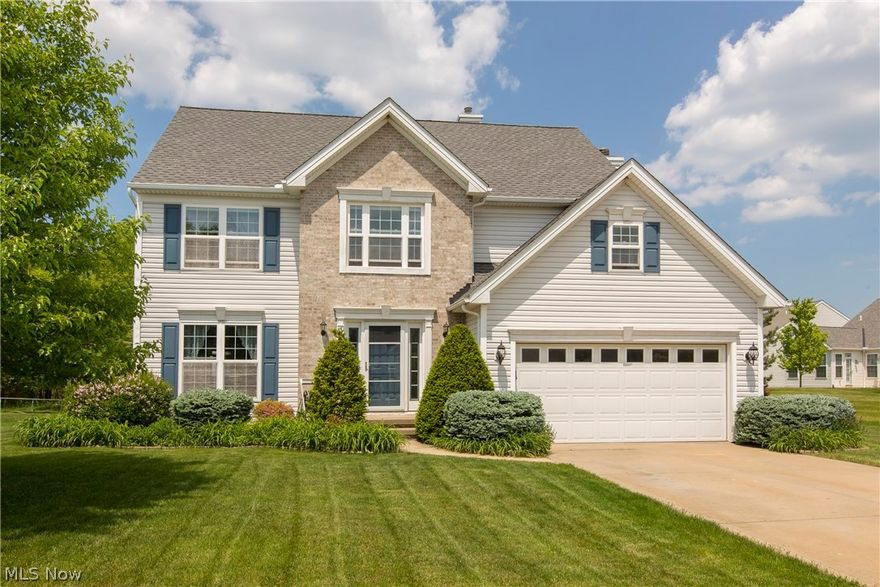 Prepare to be Moved!...into a bright & spacious Waterside Crossings colonial.  Exceptional curb appeal reflects the pride in ownership of this Avon Lake home.  Just off the foyer you’ll find a versatile space suitable as an office, formal living or dining room, depending on your family’s needs.  This leads to the wonderfully open & roomy eat-in kitchen, filled with tons of cabinets & storage, a handy breakfast bar & sliding doors from the dining area to the deck.  The adjacent family room is brightened with extra windows flanking the cozy fireplace.  Laundry room & half-bath conveniently located on the main floor.  The upper level Master Bedroom features an in-suite bath with twin sinks, separate shower & jetted tub plus generous walk-in closet.  Three more bedrooms and second full bath complete the second floor.  Full basement is plumbed for an additional bath.  Relax on the backyard deck while you enjoy the expansive back yard with private wooded views beyond.  Waterside amenities in