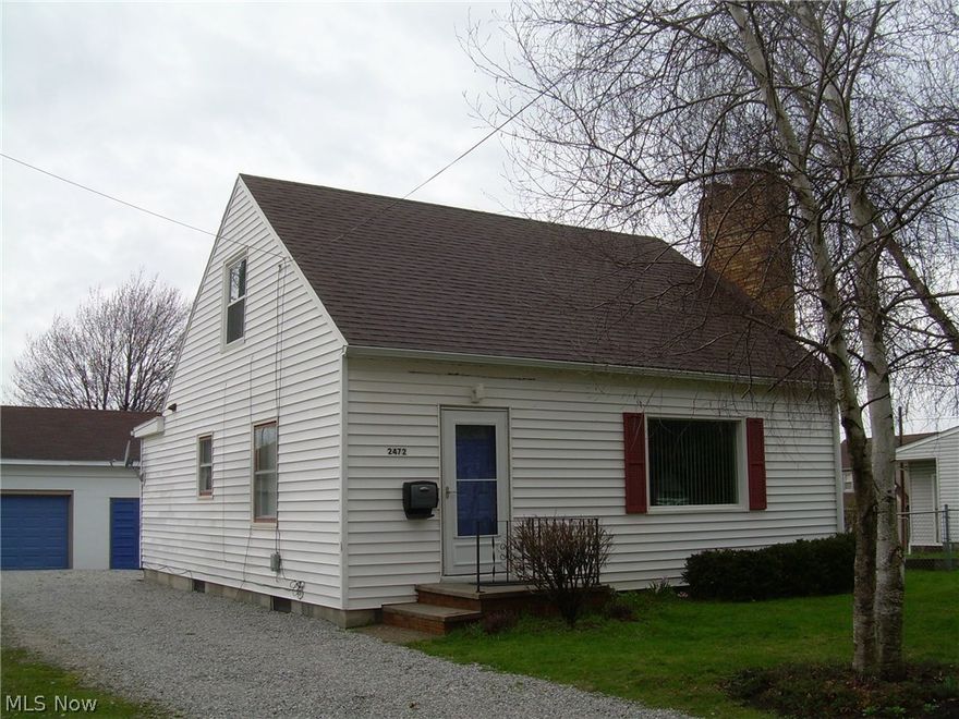 This my friends is not your standard cape cod! 2472 Nesbitt has tons to offer its new owner including beautiful fireplace in living room (currently gas could be changed back to wood), new carpet (2015), freshly painted, 1st floor bedroom with new bedroom windows (2015) and 1st floor half bath, applianced kitchen with eating area, 5 ceiling fans, newer entry doors, vinyl windows and siding, extra kitchen area in a very clean basement. 2nd fireplace in basement, 1/2 bath in basement, newer hot water tank (2012) and furnace (2012). Family room in basement. A perfect back deck. Large potentially 3-car garage or giant work shop with upstairs storage. One full and two half baths in total, newer electric box (2012), newer roof (2012), and a home warranty. You don't want to miss this one!