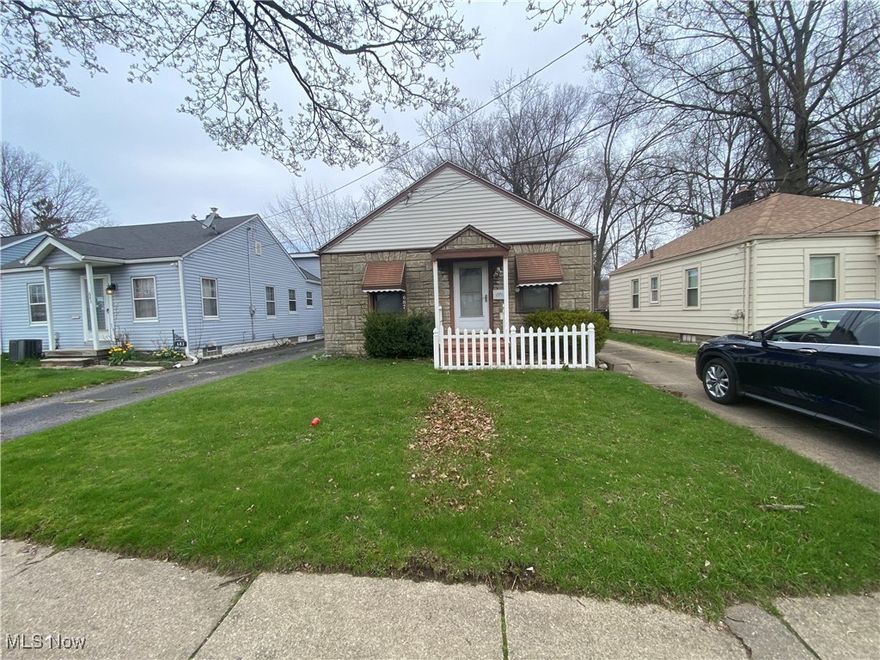 687 E Archwood Ave Akron, OH 44306 is a tenant occupied 2-bedroom Ranch home that is currently rented for $900/month and would love to stay through his lease end in September. Tenant pays utilities. This property is located just south of Downtown Akron with easy access to the highway. There is a cement driveway leading up to a single car garage. The garage has a covered side porch area to hang out in the back yard which is very manageable. The house has central air and updated water heater recently installed. The furnace appears to be newer as well. There is a stove top range and wall oven in kitchen area. There are two flanking bedrooms off the family room area. This house overall seems to be well kept and easy to manage if you're looking for a no hassle rental to purchase as investment. The house can be shown but arrangements with tenant will have to be made through the listing agent. This is part of a 7 home estate sale.