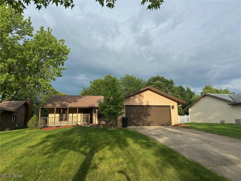 Welcome to this beautiful single-story 3-bedroom, 2-bathroom home situated on a cul-de-sac in a quiet and established neighborhood. This property features an inviting curb appeal with a covered front porch, fresh landscaping, and a spacious driveway leading to an attached garage. Inside, you will find an open-concept layout with abundant natural light. The dining area flows seamlessly into the kitchen—complete with both low counter and high counter style seating. This home offers comfortably sized bedrooms with ample closet space and two full bathrooms. A large family room offers natural light and a cathedral ceiling. The living room has a wood burning fireplace. Step outside to a private, fenced backyard featuring a shaded patio area—perfect for outdoor dining or relaxation. Whether you are entertaining or simply enjoying a quiet evening, this home provides the ideal backdrop for your lifestyle. Backyard has a modest basketball court and large shed.