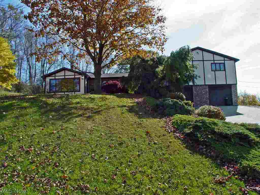 Check out this beautiful 4 BR, 2 BA home sitting on 1 acre w/ 2 car att. garage and 2 car det. garage w/ loft. Kitch boasts 2 pantries, 2 wolf ovens and island. All w/ granite countertops. Wine cellar, Fam rm w/ wet bar, massive formal DR w/ Bose sound system. In ground 17 X 32 pool! A must see!