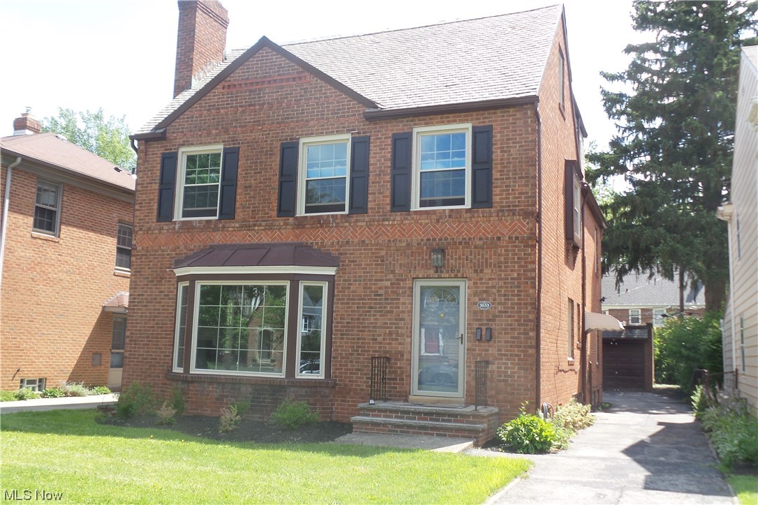 Beautiful 2 family all brick colonial with 2 bedrooms down and 5 bedrooms up, 2 on the 2nd floor and has a finished third floor with 3 bedrooms and full bath, 3 car garage and partially finished basement. Improvements include updated kitchens on both units with new cabinets , granite countertops and stainless steel dishwasher and new flooring. all 3 baths have also been updated. Other improvements include new HVAC , new vinyl windows, updated electrical and plumbing, freshly painted thru out and new carpeting on the 3rd floor. Features include hardwood floors thru out 1st and 2nd floor, built in cabinets in dining room, 1st and 2nd floor rear porch, garage openers and glass block windows. Home to be point of sale compliant with the City of Shaker Heights.