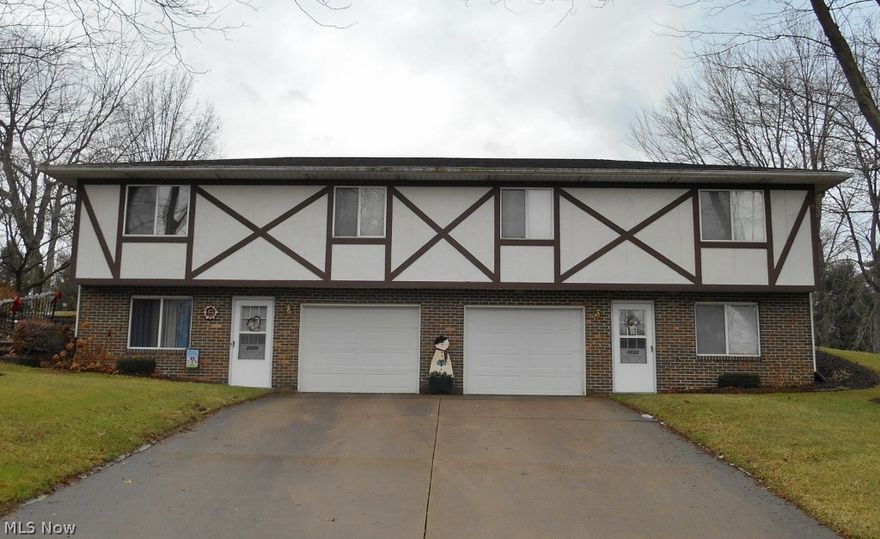 Very well maintained brick duplex on large corner lot in Perry Township. Each side features a fully applianced eat in kitchen, 2 bedrooms, full bath. Lower level has11'X16' family rooms, laundry rooms and attached 12'X24' garages.  Duplex has a 30 year roof (2008), furnaces and a/c(2013), garage doors(2010) and hot water tanks.  Unit 3133 new refrigerator in 2017 and unit 3135 new dishwasher in 2015. Easy to show unit 3135, if interested will set up unit 3133 for a showing. Long time tenants wish to stay.