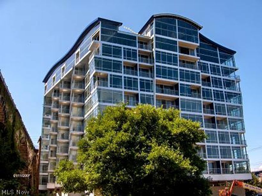 Last developer owned Penthouse at Plaza.  1,800+ sqft 3 bedroom 2-story corner unit with loft, roof deck, balcony and two indoor parking spaces.  Open stairwell to second floor, side by side laundry area, amazing views of downtown and the Flats.  Buyer has color choice for hardwood floors carpet and paint.  Tax Abatement until 2021.