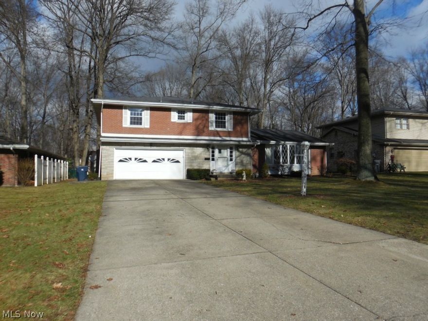 If you have seen this home in the past, take a minute and look again! The sellers just professionally removed all the wallpaper and freshly painted the interior! It looks awesome! Take a look at the new pics! Quality built home, spacious and roomy! Beautiful exterior. So much sq footage! Formal living room is plush carpeted with large picture window. The formal dining room has slider doors leading to a great back yard. Nice sized kitchen with an eat in area. Family room with wood-burning fireplace, and doors lead to the Florida room! First floor laundry, first floor half bath. Upstairs are three large bedrooms! The master bedroom has hardwood flooring, a walk in closet with great built ins & Master bath! The two guest beds share a full bath, both are plush carpeted, have great closet space and plenty of space! Hardwoods under the carpet. In the finished basement there is another fireplace, a bar, and plenty of space to make it your own! 2 car attached garage with lg storage room. Nice