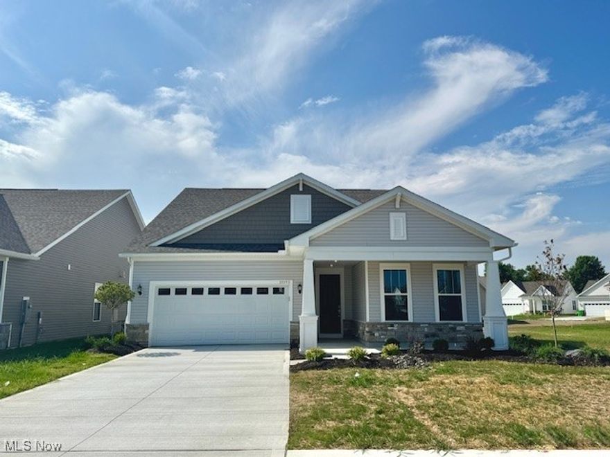 Turn-key & stunning! This newly completed ranch-style beauty with finished loft checks every box—and it’s now available at an unbeatable price for exceptional value! Designed for comfort and flexibility, the spacious main level features a luxurious primary suite, a guest ensuite with walk-in closet, and a versatile flex room perfect as a den, office, dining room, or 4th bedroom. The open-concept great room flows into a gourmet kitchen with built-in gas range and wall oven, elegant 42” cabinets with dovetail soft-close drawers, and a massive granite island fit for six. Soaring 9.5’ ceilings, an 8’ front door, and a grand foyer create a breathtaking welcome. Upstairs, the airy loft offers added living space, another bedroom, and a full bath. Step outside to a fully landscaped yard, plus a covered front porch and covered rear patio ideal for relaxing or entertaining. Located centrally near the community pool, this home offers convenient access and low-maintenance living in a vibrant neighborhood. Whether you're downsizing, nesting closer to family and friends, or seeking a carefree lock-and-go lifestyle, this home is move-in ready and waiting for you!