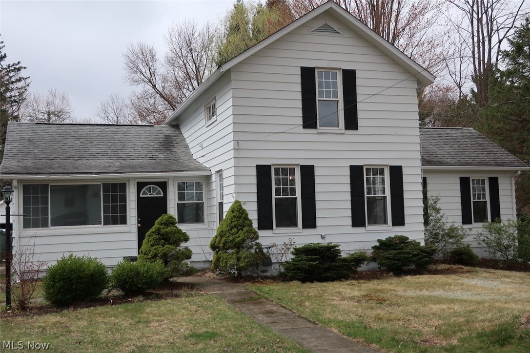 Well maintained cape features updated living room w/ fresh paint, ceiling fan and carpet! Updated kitchen w/ white shaker cabinetry, countertops, new appls and flooring! Kitchen open to charming dining room w/ built ins, fresh paint and flooring! First floor master bedroom w/ double closets and half bath! First floor laundry! Updated main bath! Upstairs you will find 2 bedrooms with tons of storage and built-ins and new carpet! Charming enclosed front porch/mud room w/ luxury vinyl flooring and heat! Unfinished cellar style basement w/ newer HWT! 2 car detached garage w/ cement drive and covered rear patio! Newer windows! Exterior of home freshly painted! Close to shopping and amenities! Move right in!