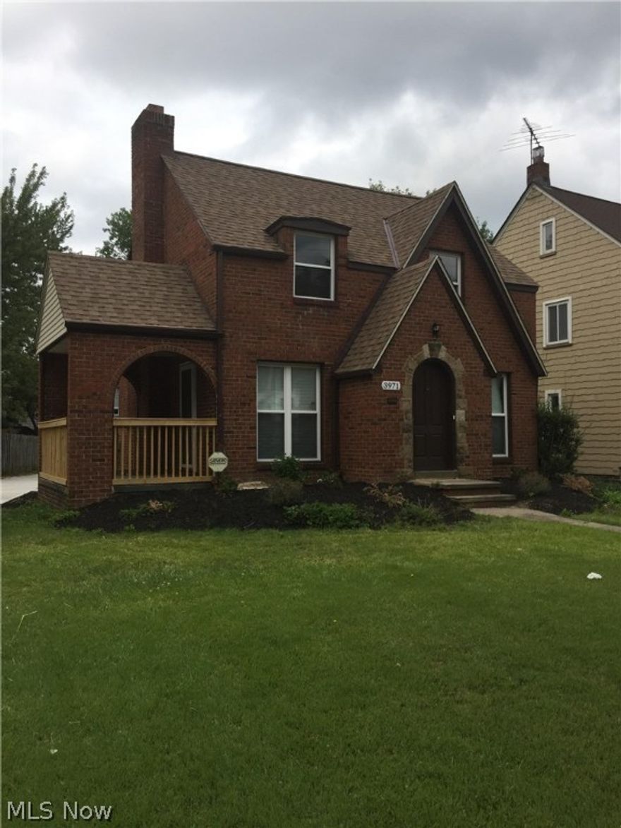 Come home to this completely redone 1937 brick colonial with a large first floor living area, dining room and kitchen with eat-in breakfast nook. Charm abounds with the original hardwood floors, all lovingly maintained, original door handles, furnace covers, and fireplace. A covered porch off the living room is a great place to enjoy the summer nights, or fall mornings with your coffee and newspaper. This entire house screams CHARM! All new lighting and bath/kitchen fixtures throughout, a completely renovated kitchen with granite counter tops and stainless steel sink. Bathroom boasts all new fixtures, tub, tile, sink, granite vanity and toilet. New roof, new concrete drive and walkway, new AC, new windows, new electrical, new hot water tank and new furnace, all installed 2017. Fireplace is decorative ONLY. Home is being sold AS IS and no repairs will be made, nor are needed. It has already passed the city POS, certificate is avail and many previous contingencies were made with prior of