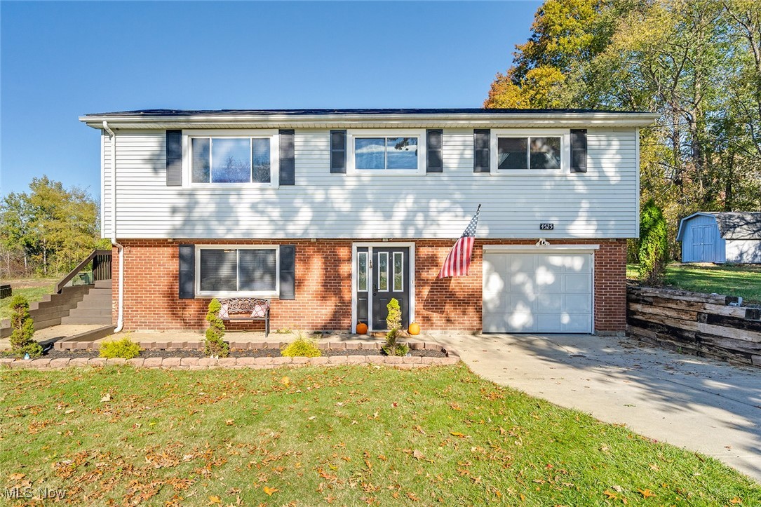 Move-In Ready and Full of Personality!
Welcome home to this lovely 3-bedroom, 2-full-bath bi-level that’s equal parts charm and function. The remodeled kitchen and bathrooms bring a fresh, modern feel, while the beautiful hardwood floors upstairs add warmth and character. Enjoy a spacious living room on the main level and a cozy family room downstairs—complete with a bar that’s perfect for entertaining or relaxing after a long day. Outside, unwind on the deck, gather around the fire pit, or host summer get-togethers. With a one-car garage and thoughtful updates throughout, this home truly has something for everyone! If you love taking a run or a bike ride the local bike trail is literally right outside your back door to enjoy. Recent updates include New Roof-2023, both Bathrooms and Kitchen.